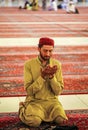 Hajj pilgrim prays in Nabawi Mosque, the biggest and holiest mosque in Medina, Saudi Arabia