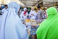 Hajj and Umra pilgrims looking for souvenirs in a shop around Nabawi Mosque during hajj period