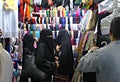 Hajj and Umra pilgrims looking for souvenirs in a shop during hajj period