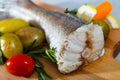 Tail of hake by rustically frying and served with boiled potatoes and tomatoes