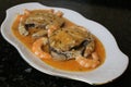 Hake fillets in prawns sauce a fish dish