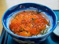 Hakodate, Hokkaido, Japan - Ikura don, a Japanese traditional rice bowl dish topped with red caviar made from the roe of salmon. Royalty Free Stock Photo