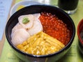 Hakodate, Hokkaido, Japan - Kaisen don, a Japanese traditional rice bowl dish topped with Thinly-sliced sashimi and fish roe. Royalty Free Stock Photo