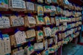 HAKONE, JAPAN - JULY 02, 2017: EMA at Kiyomizu-dera Temple. EMA are small wooden plaques on which Shinto worshippers Royalty Free Stock Photo