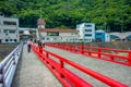 HAKONE, JAPAN - JULY 02, 2017: Red bridge over the river at Odawara, transition point to Hakone