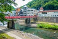 HAKONE, JAPAN - JULY 02, 2017: Red bridge over the river at Odawara, transition point to Hakone