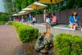 HAKONE, JAPAN - JULY 02, 2017: Unidentified people refresing their foots inside of water at Hakone Open-Air Museum or Royalty Free Stock Photo