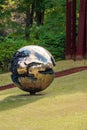 HAKONE, JAPAN - NOVEMBER 5, 2017: Sculpture mirror ball, open air museum. Copy space for text. Vertical.