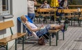 People relaxing in the sun on theDiedamskopfbahn i Austria a skilift with a fantastic view over the alps