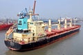 Haldia, India, October, 27, 2020. Seagoing vessels, tugboats at the port under cargo operations and underway.