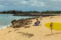 Local hawaiian man fishing on the beach on North shore of Oahu