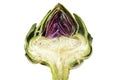 Half artichoke, showing the heart and choke under the leaves, is