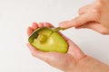 Half of avocado on human hand Royalty Free Stock Photo