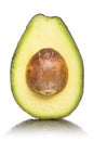 Half of an avocado with kernel and reflection Royalty Free Stock Photo