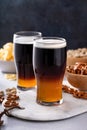 Half and half beer cocktail with lager and dark stout Royalty Free Stock Photo