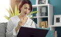 Woman sitting sofa using laptop Royalty Free Stock Photo