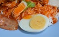 Half boiled egg with barbecue porkin rice