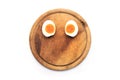 Half boiled eggs Placed on a wooden cutting board. Royalty Free Stock Photo