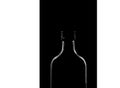 Half a bottle on a black background. Only the silhouette is visible. Place for text. Copy space Royalty Free Stock Photo