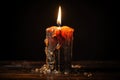 a half-burned candle still emitting light Royalty Free Stock Photo