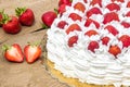 Half cake with strawberries summery cake.