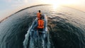 Half-circle view of the autoboat being handled by two men