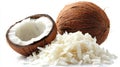 Half a coconut with shredded coconut flakes spilling on a white table top view Royalty Free Stock Photo