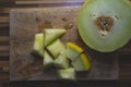 The half and cut pieces of the cantaloupe melon Royalty Free Stock Photo