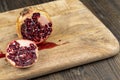Half-cut ripe red pomegranate with mold
