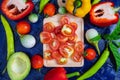 Half cut tomato background and healthy vegetables.