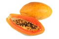 Half cut and whole papaya fruits on white background Royalty Free Stock Photo