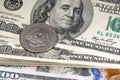 Half Dollar Coin of the United states of America on top of a stack of hundred Dollar bills. Money and Cash Royalty Free Stock Photo