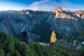 Half Dome and Yosemite Valley in Yosemite National Park during colorful sunset with trees and rocks. California, USA Royalty Free Stock Photo