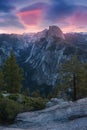 Half Dome and Yosemite Valley in Yosemite National Park during colorful sunrise with trees and rocks. California, USA Sunny day Royalty Free Stock Photo