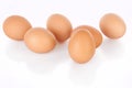 Half dozen brown chicken eggs isolated on white