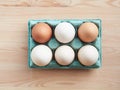 half dozen of fresh raw eggs brown Royalty Free Stock Photo