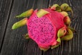 Half dragon fruit on a wooden planks Royalty Free Stock Photo