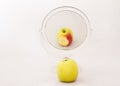 Half eaten apple in a mirror concept pretend Royalty Free Stock Photo