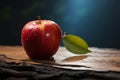 A half eaten apple sits quietly upon the tables surface