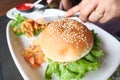 half eaten beef burger on table close up Royalty Free Stock Photo
