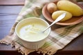 half-eaten bowl of potato leek soup showing spoon and napkin Royalty Free Stock Photo