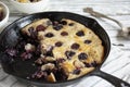 Half Eaten Cherry Cobbler Baked in Cast Iron Pan Royalty Free Stock Photo