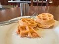 Half eaten make-your-own waffles from a hotel free breakfast buffet Royalty Free Stock Photo