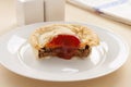 Half Eaten Meat Pie Royalty Free Stock Photo