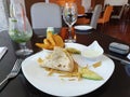 half eaten quesadillia with avocado and a tequilla cocktail at the raddison