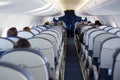 Passenger inside cabin flight gray interior half empty salon problem porthole window Royalty Free Stock Photo