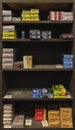 Half empty shelves with rifle ammo boxes at a gun shop, ammunition shortage in California, USA