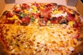 Half Extra Cheese and Half Supreme Italian Pizza