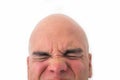 Half face of bald man in white background. Royalty Free Stock Photo