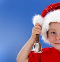 Half face of bell ringing little boy on blue Royalty Free Stock Photo